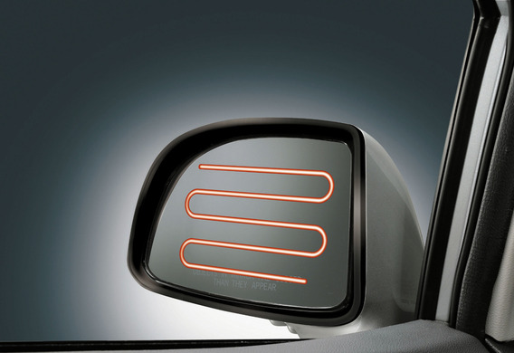 Как включается обогрев зеркал заднего вида на VW Golf VI? фото