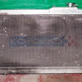 Как установить защитную сетку перед радиатором охлаждения KIA Sorento II фото