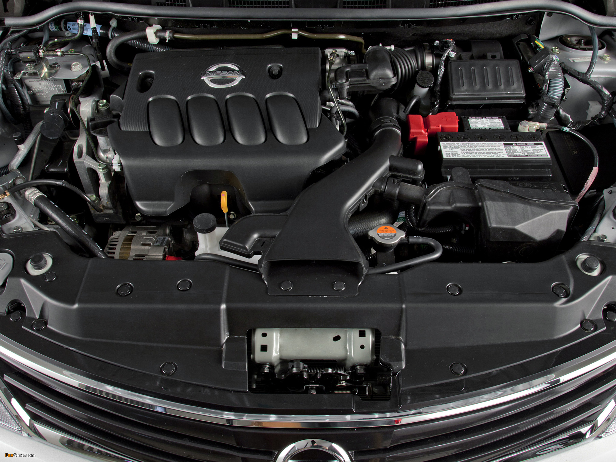 При запуске двигателя слышится булькающий звук на Nissan Tiida фото