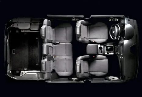 Складывание сидений третьего ряда на Mitsubishi Pajero 4 фото