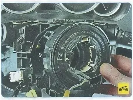 Демонтаж спирального контакта рулевого колеса Mazda 6 II фото