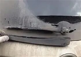 Обломился кончик поводка заднего дворника на Nissan Qashqai I фото