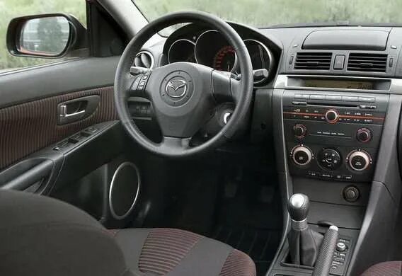 Проверка свободного хода рулевого колеса на Mazda 3 (I) фото